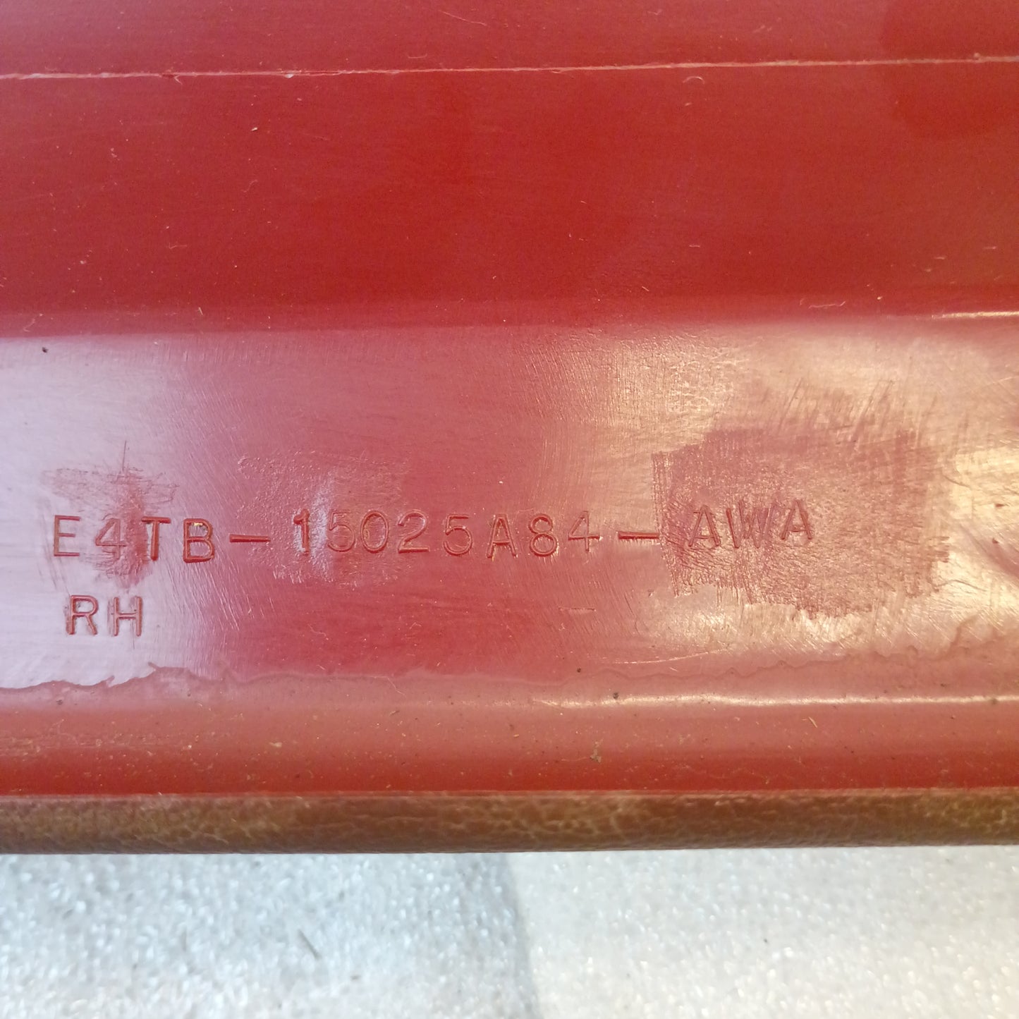 Red A pillar trim piece for 1980-1986 Ford trucks and Bronco, part number E4TB-15025A84-AWA, in very good condition.
