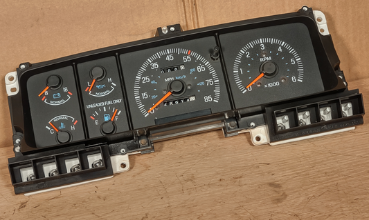 1987-1991 Ford F-Series instrument cluster with tachometer, oil pressure, voltage, temperature and fuel gauges