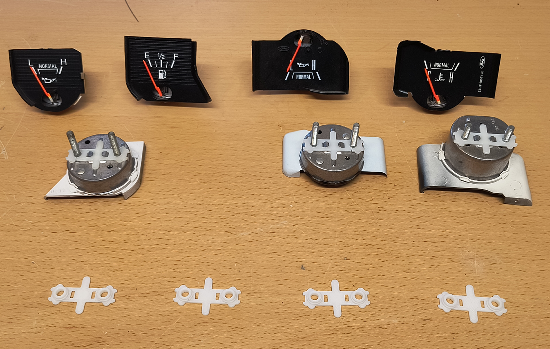 1970s-80s Ford fuel, oil pressure and temperature gauges shown front and back with white Blue Truck Parts screw retainers installed, plus four new retainers