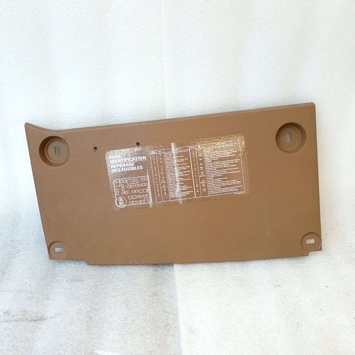 87-91 Tan Fuse Panel Cover (Used)  Lower Dash Trim Knee Bolster F150 F250 F350 Bronco