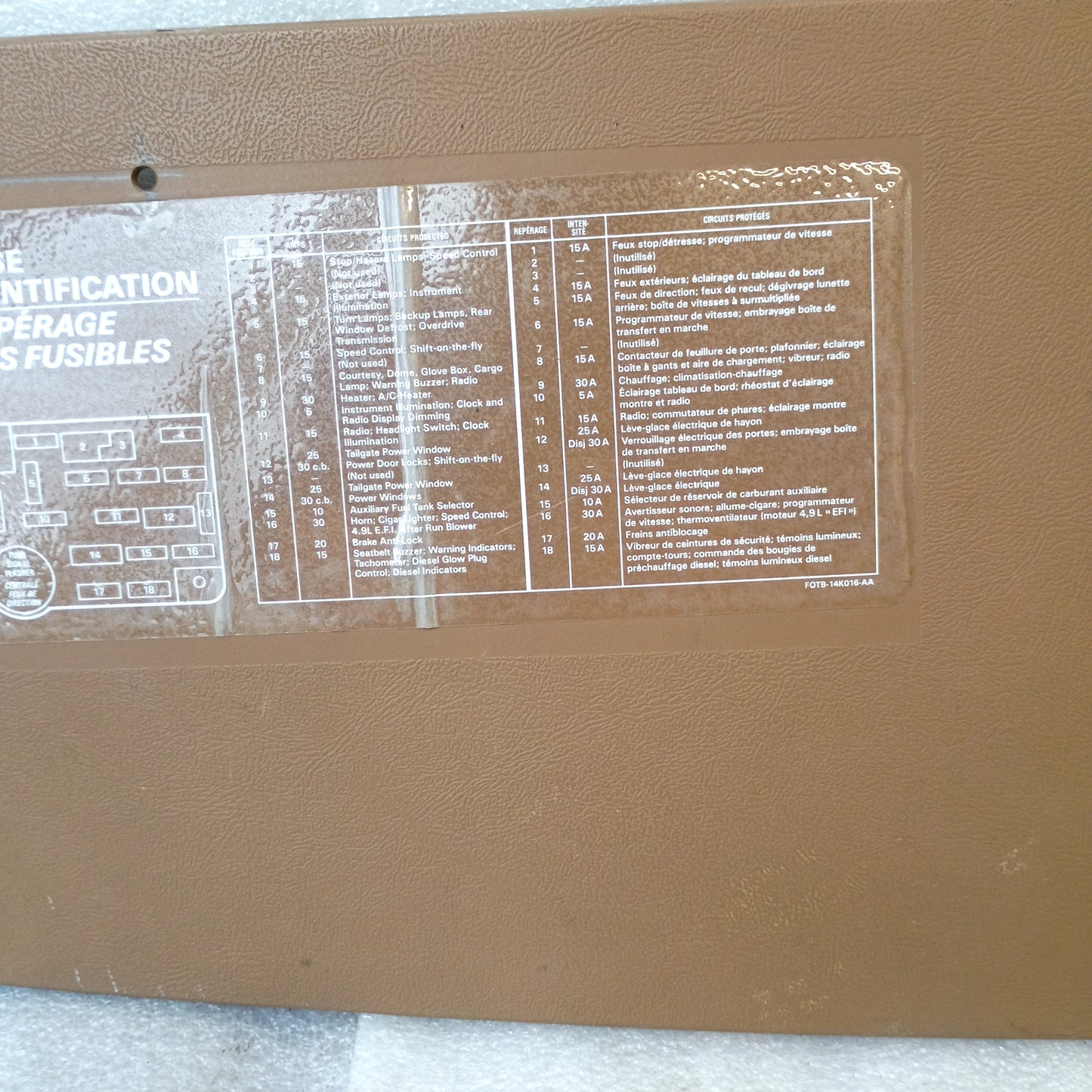 87-91 Tan Fuse Panel Cover (Used)  Lower Dash Trim Knee Bolster F150 F250 F350 Bronco