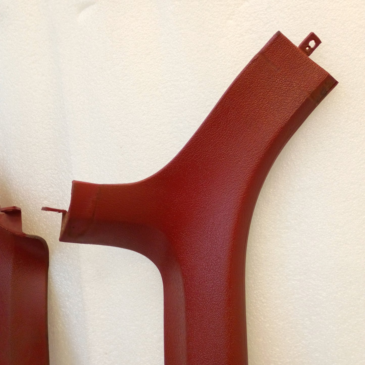 Red A-pillar trim set for 1980-1986 Ford Bronco, F-150, F-250, F-350; original Ford parts in very good condition.