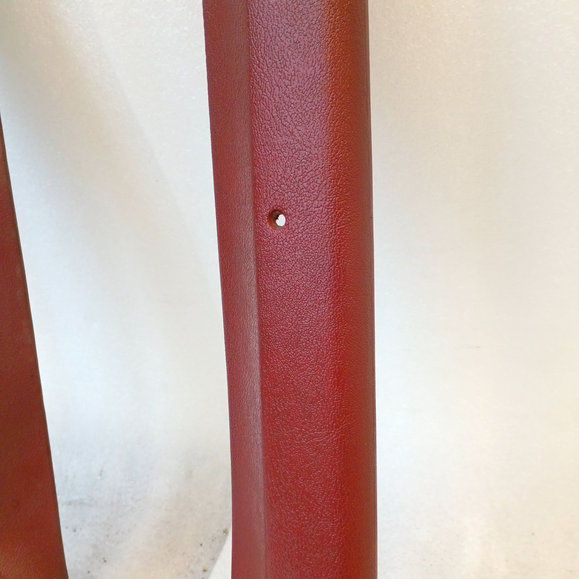Red A-pillar trim set for 1980-1986 Ford F-Series and Bronco, showing textured finish and minor blemish.