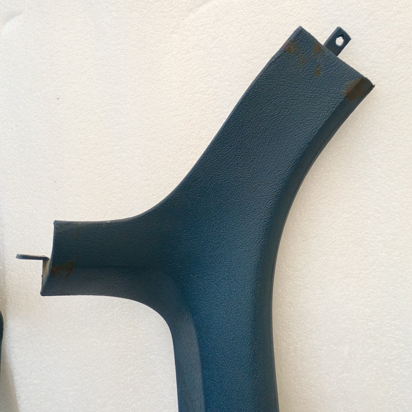 Harbor Blue A-Pillar Trim piece for 1980-1986 Ford Bronco, F150, F250, F350; original part with minor blemishes.