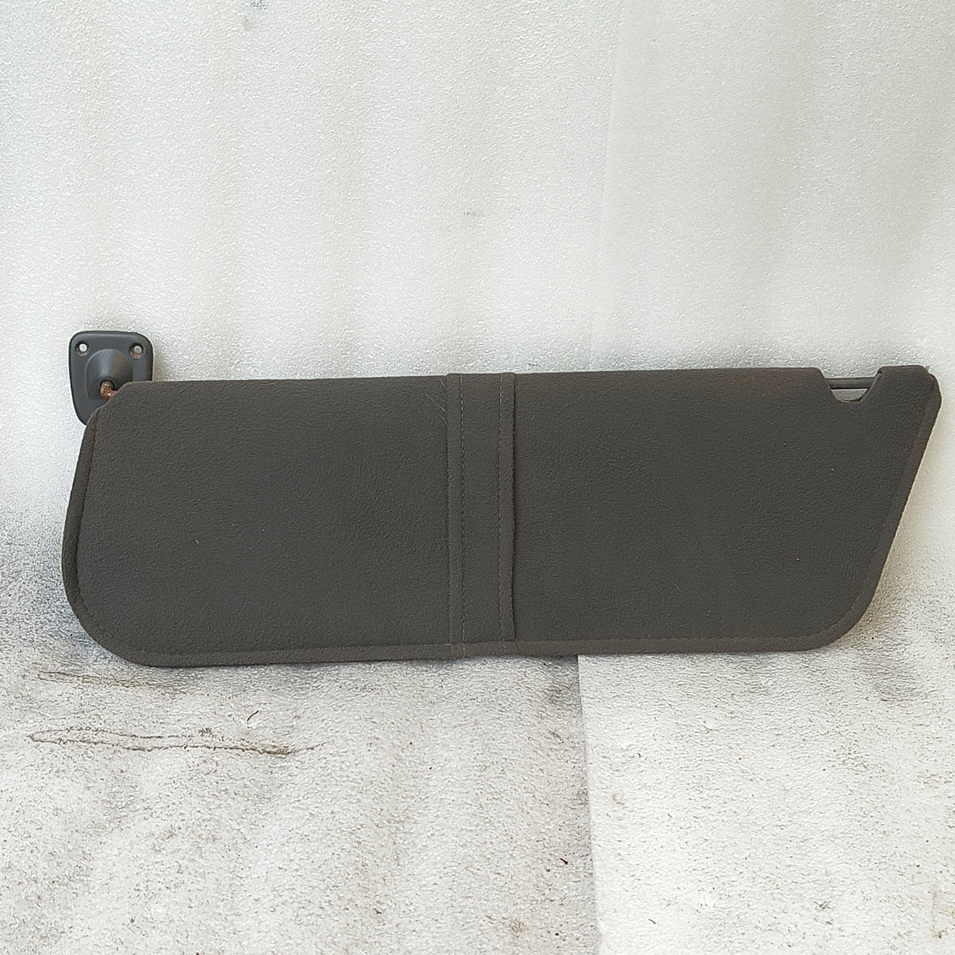 Dark/Granite Gray cloth sun visor for 1992-1997 Ford models; includes hinges/swivels, OEM Ford part.