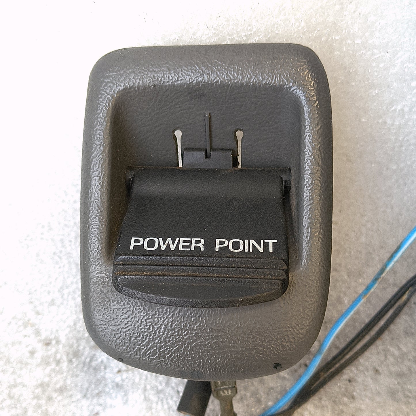 Granite gray ashtray assembly with "Power Point" label, wiring harness, and mounting bracket for 1992-1996 Ford trucks.