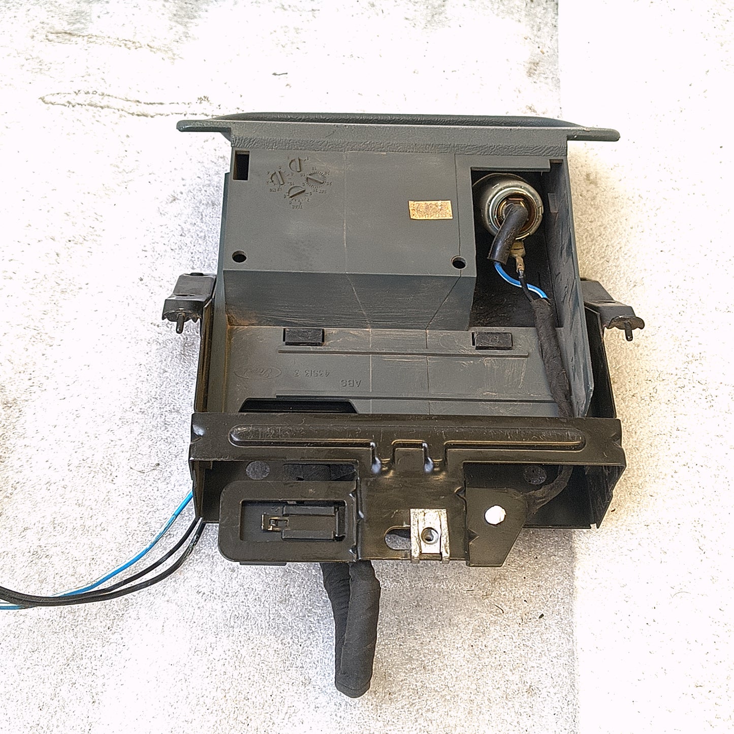 Granite gray ashtray assembly with power port and wire harness for 1992-1996 Ford F150, F250, F350, and Bronco.