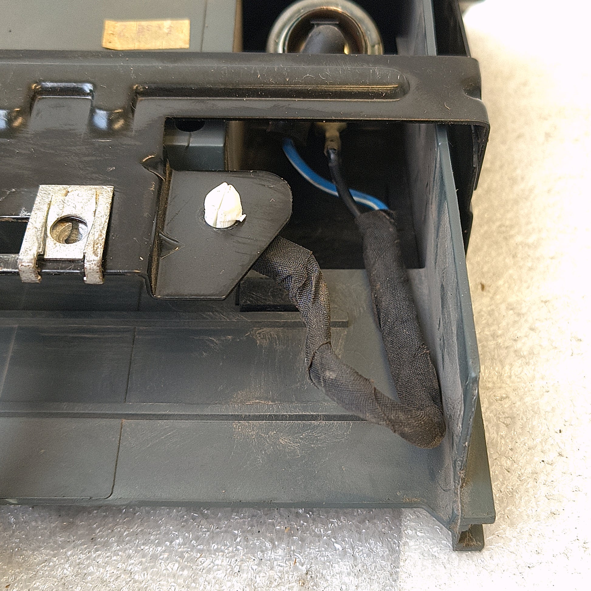 Granite gray Ford ashtray assembly with power port and wire harness. Compatible with 1992-1996 Ford Bronco, F150, F250, F350.