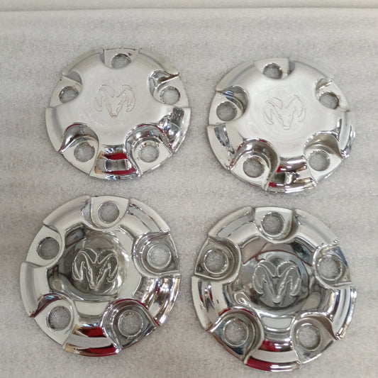Set of four chrome Dodge/Ram 1500 center caps with solid face and Ram logo, compatible with 2002-2014 models.
