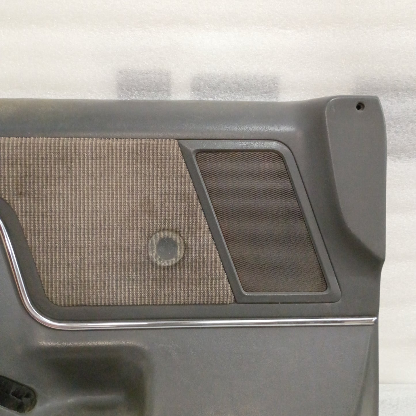 Deluxe dark gray door panel with carpeted insert and speaker grille for 1987-1991 Ford F150, F250, F350, Bronco.