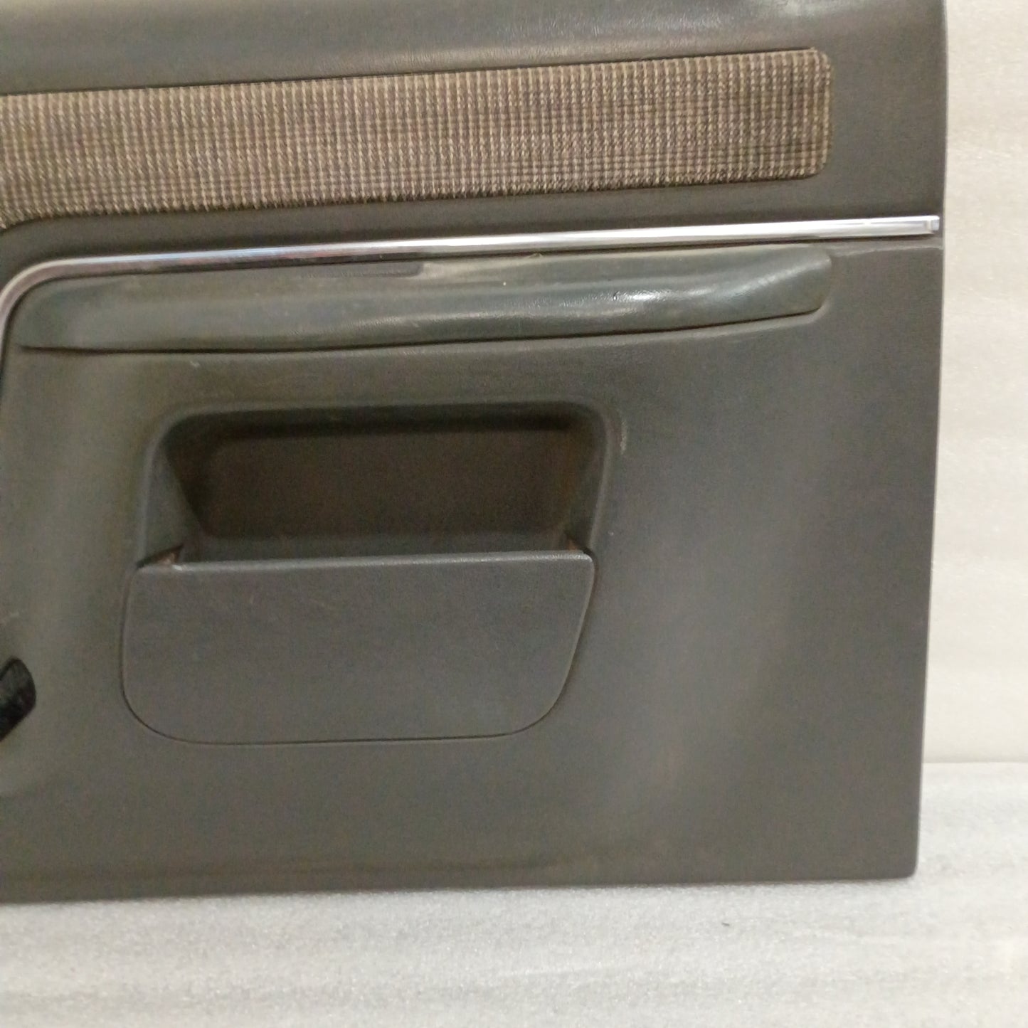 Deluxe dark gray door panel with carpeted insert and map pocket, compatible with 1987-1991 Ford F150, F250, F350, Bronco.