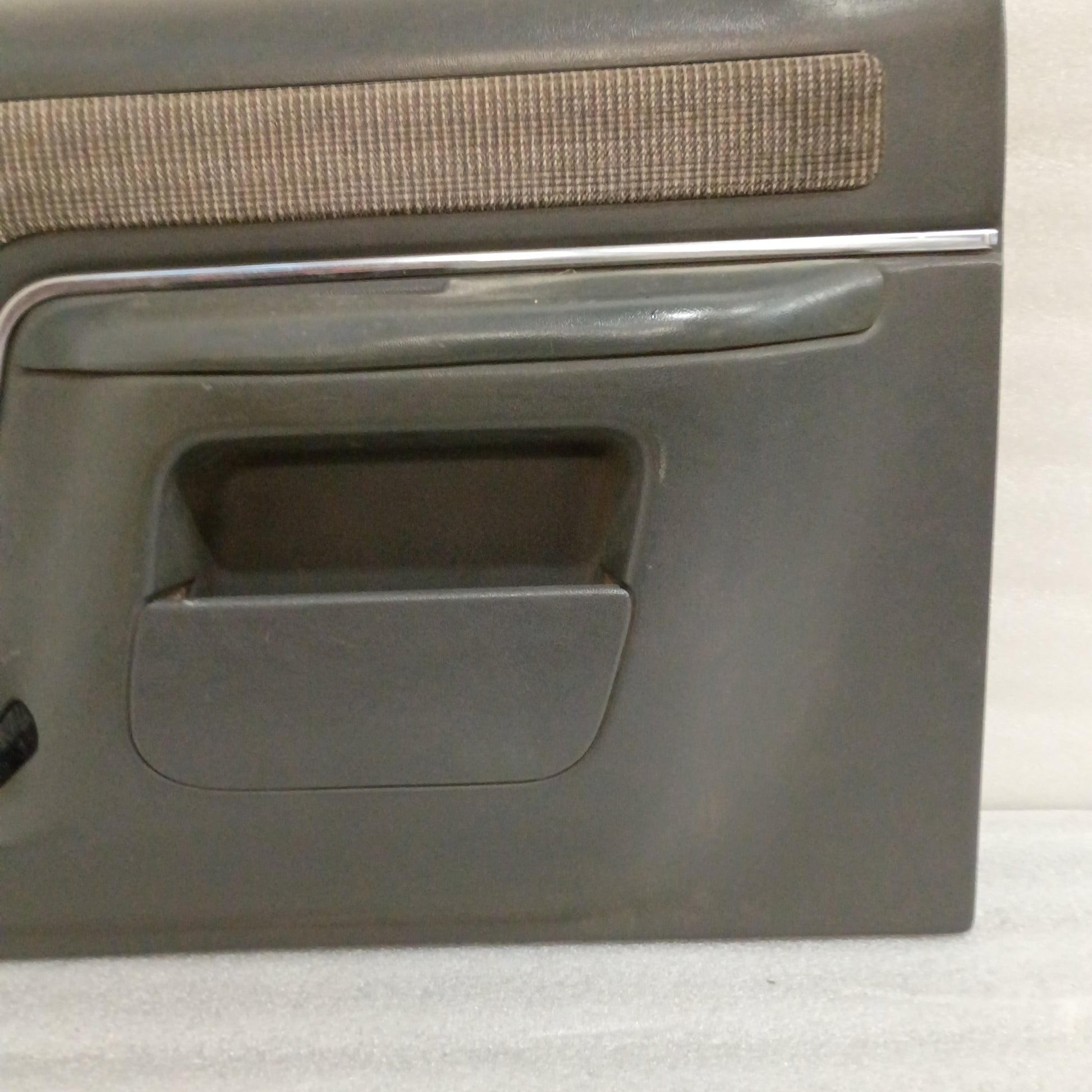Deluxe dark gray door panel with carpeted insert and map pocket, compatible with 1987-1991 Ford F150, F250, F350, Bronco.