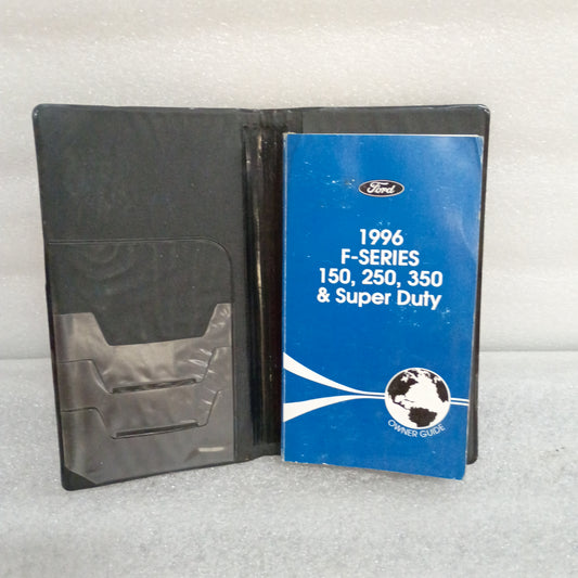 1996 Ford F-Series Owner Guide and cover case for F-150, F-250, and F-350, in good used condition with some wear.