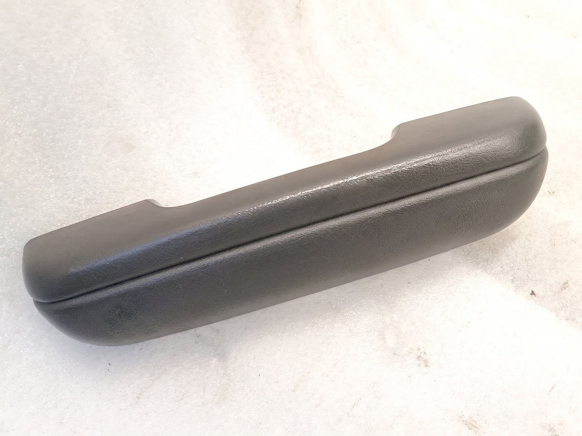 Gray arm rest and interior door handle for 1989-1995 Toyota Pickup/4Runner, slight wear on corners, OEM part 74210-89106.