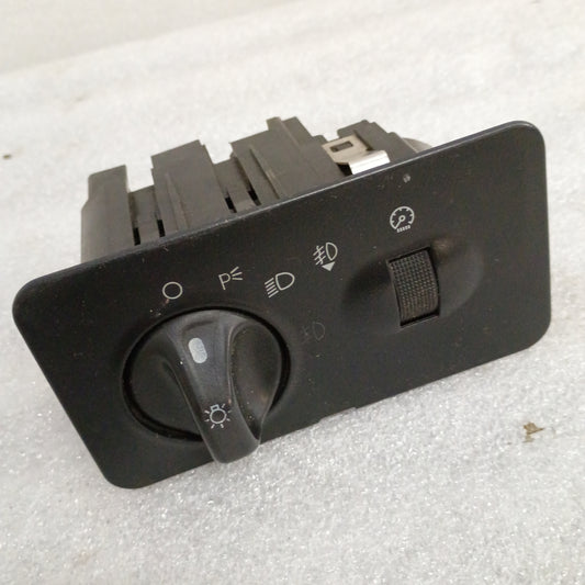 Headlight panel with switch and dimmer for 2001-2004 Ford F250/F350 Super Duty, controls headlights and parking lights.