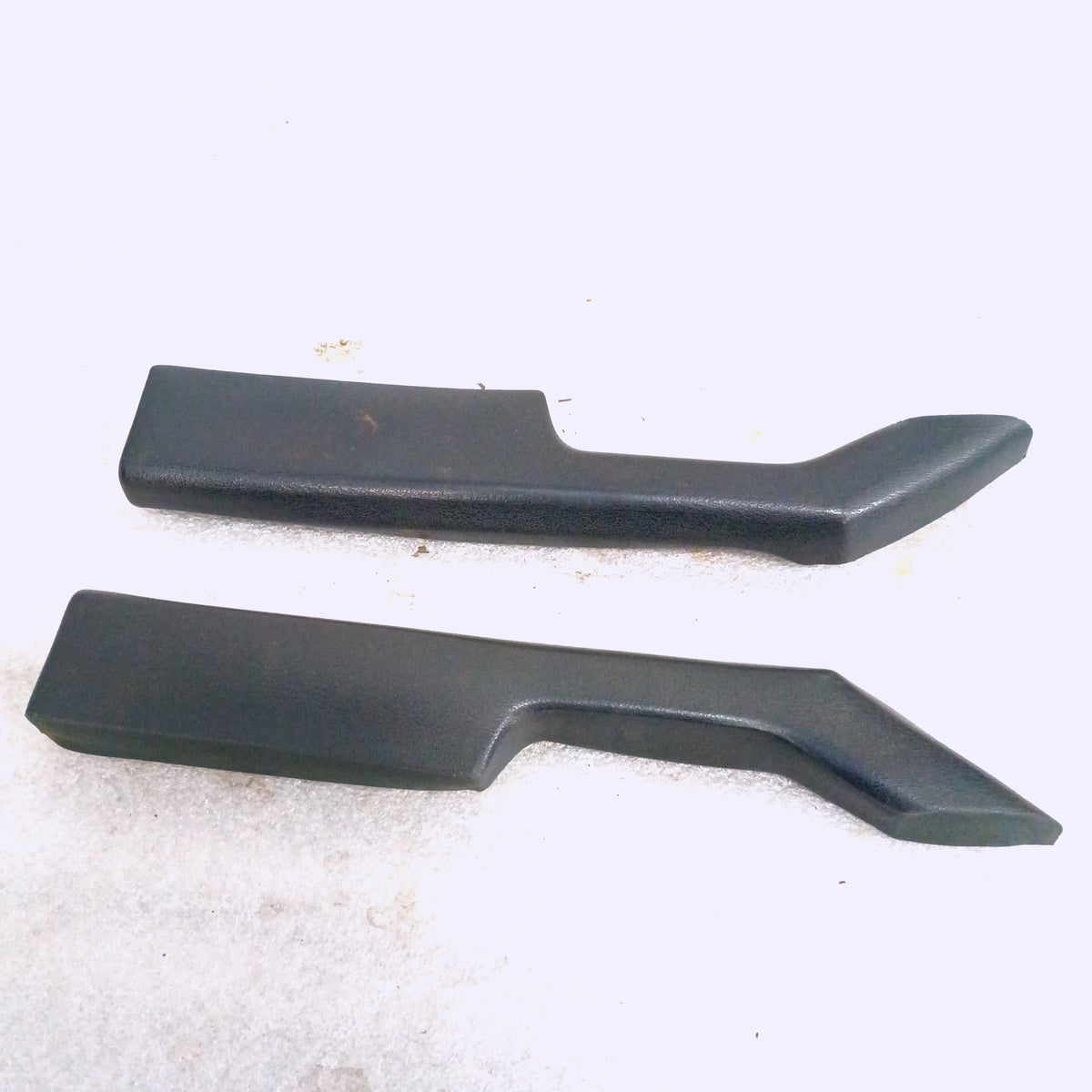 Dark Harbor Blue OEM armrest set for 1980-1986 Ford F-150, F-250, F-350, and Bronco, in good condition.