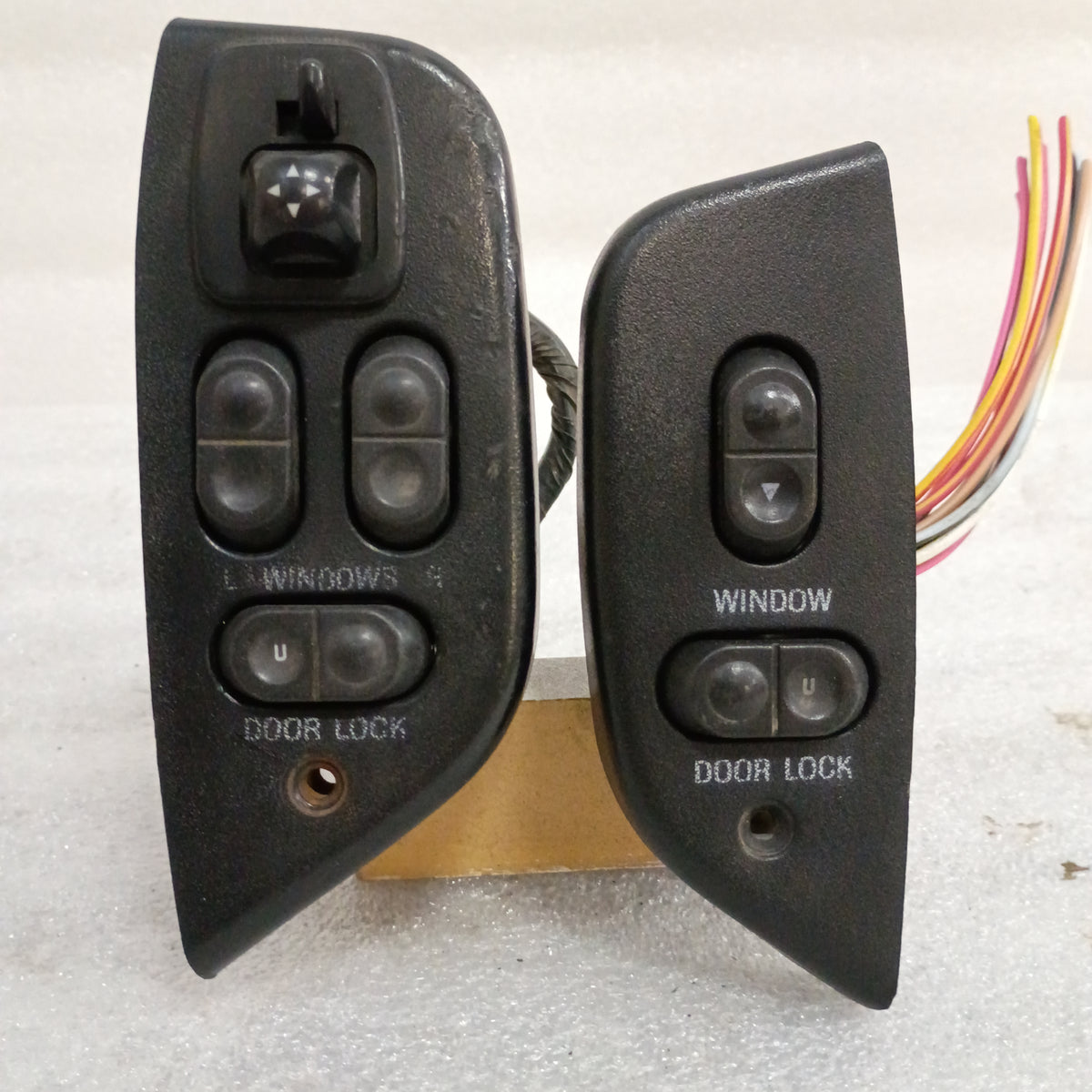 Ford left and right power window, door lock, and mirror switch set with black bezels and wire pigtail.