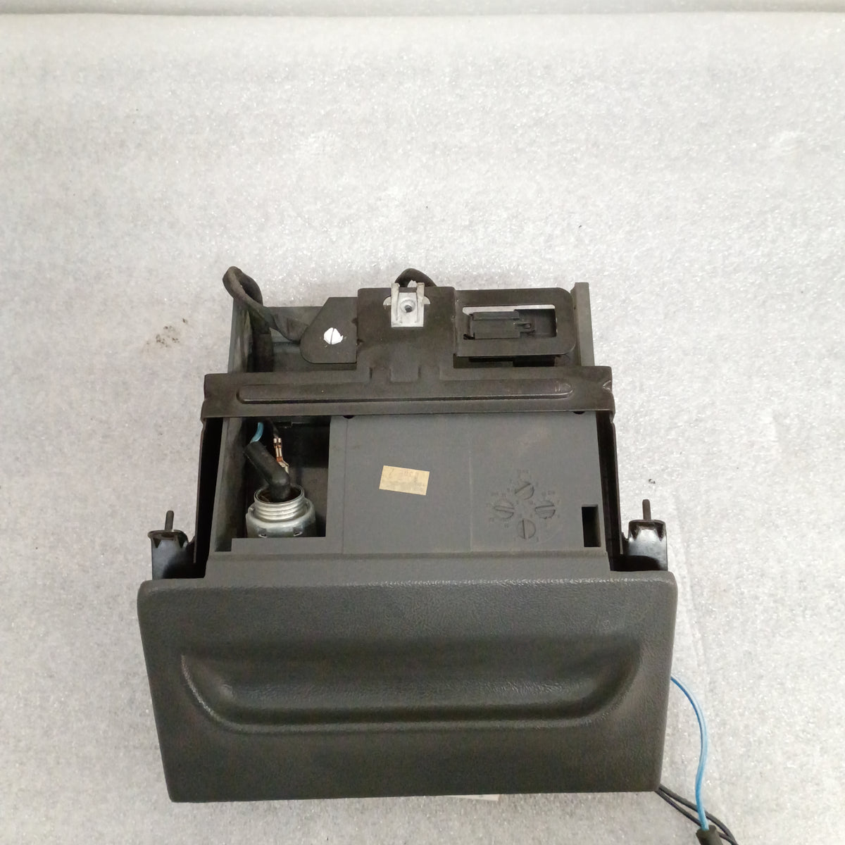 Granite gray ashtray assembly with mounting bracket and power port for 1992-1996 Ford F-150, F-250, F-350, Bronco.