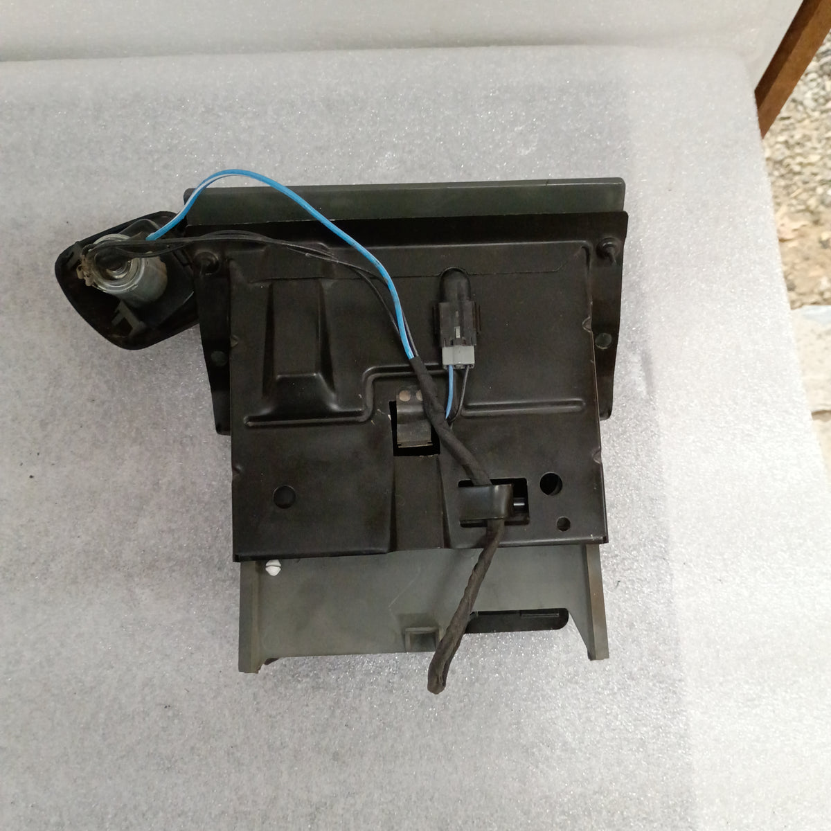 Granite gray ashtray assembly with power port and mounting bracket, compatible with 1992-1996 Ford Bronco and F-Series trucks.