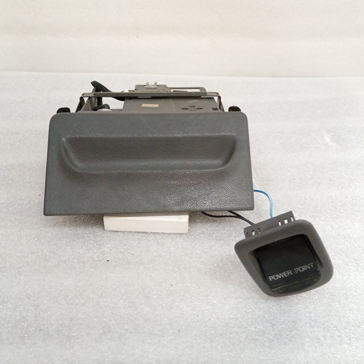Granite gray ashtray assembly with mounting bracket and power port for 1992-1996 Ford F150, F250, F350, Bronco.
