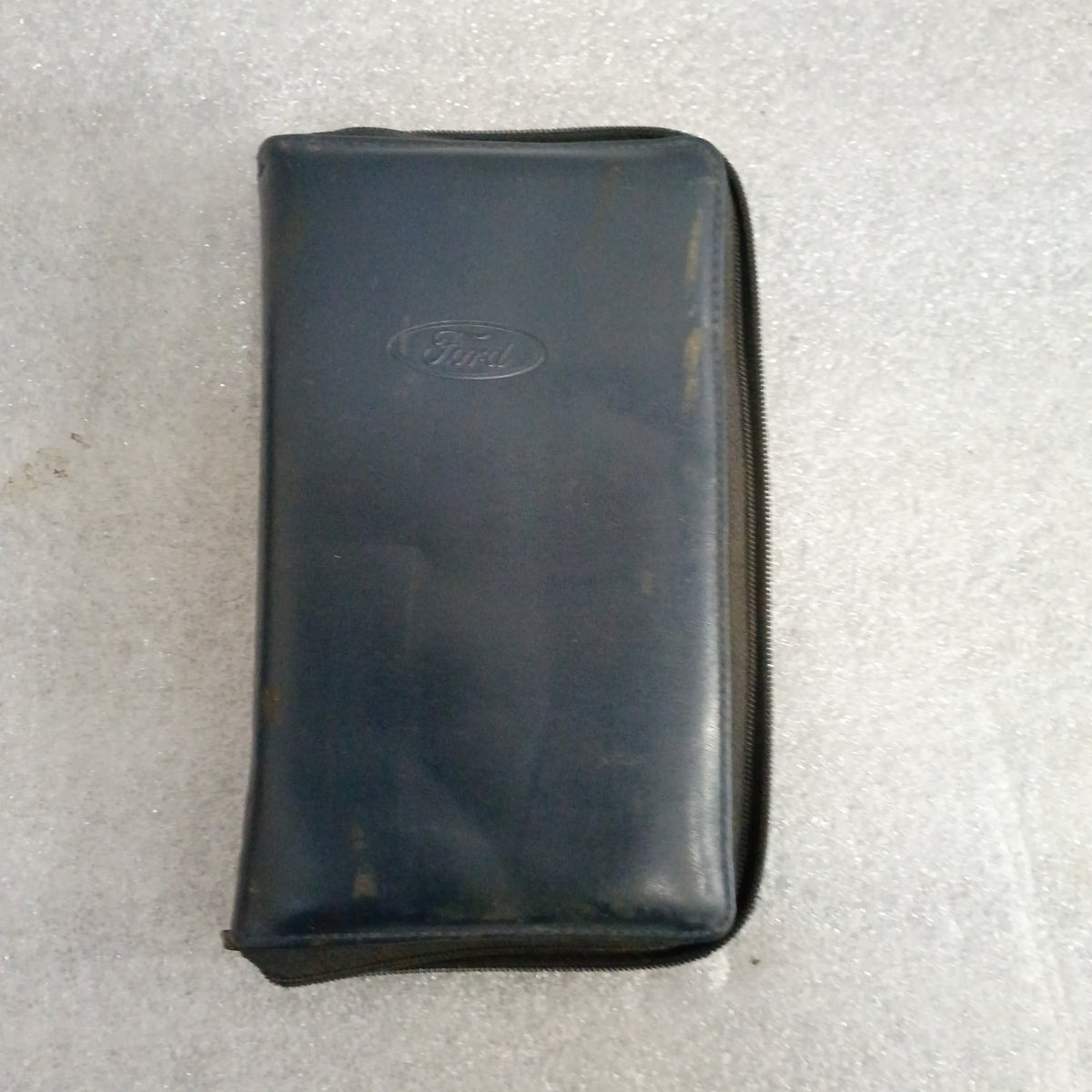 Ford vinyl case containing 1997 F-250 HD, F-350, F-Super Duty manuals, maintenance schedule, and warranty info in used condition.