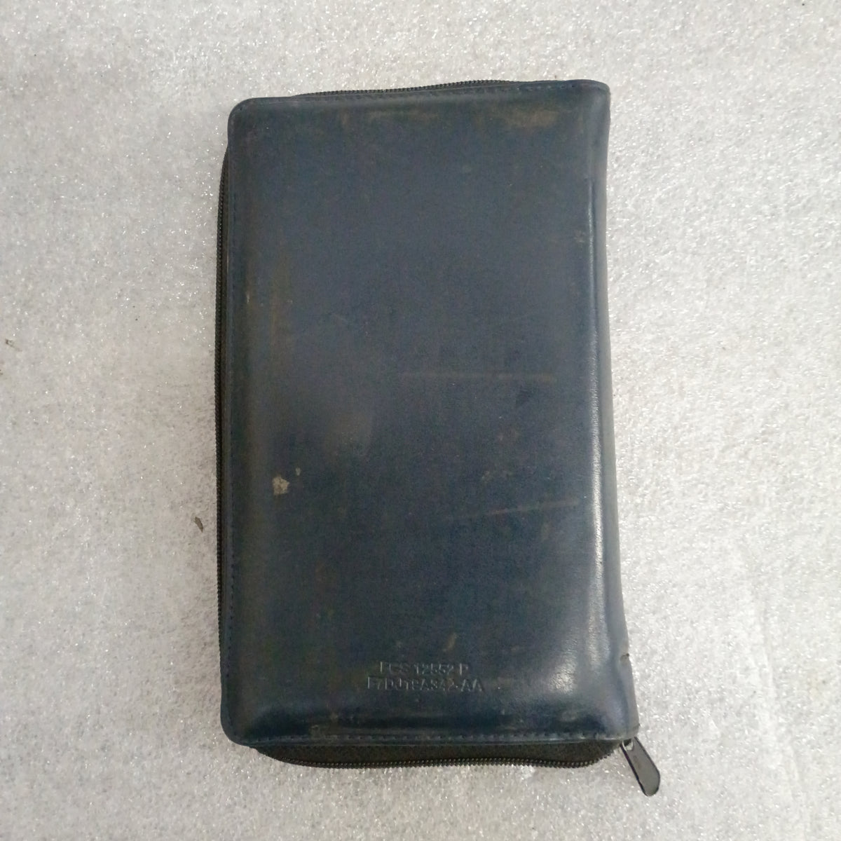 Blue vinyl zippered case for 1997 Ford F-250 HD, F-350, F-Super Duty Owner Guide Manual Set, in used condition.