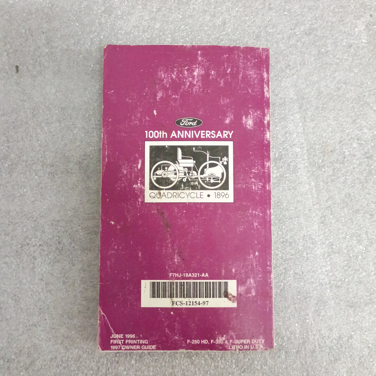 1997 Ford F-250 HD F-350 Owner Guide Manual in used condition, 100th Anniversary cover, featuring Quadricycle illustration.