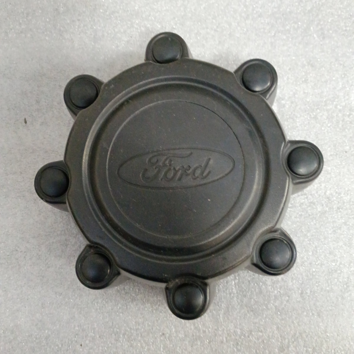 99-04 OEM Flat Black Center Caps 8 Lug 4WD (Set of 4) (Used) Ford F250 F350 Super Duty