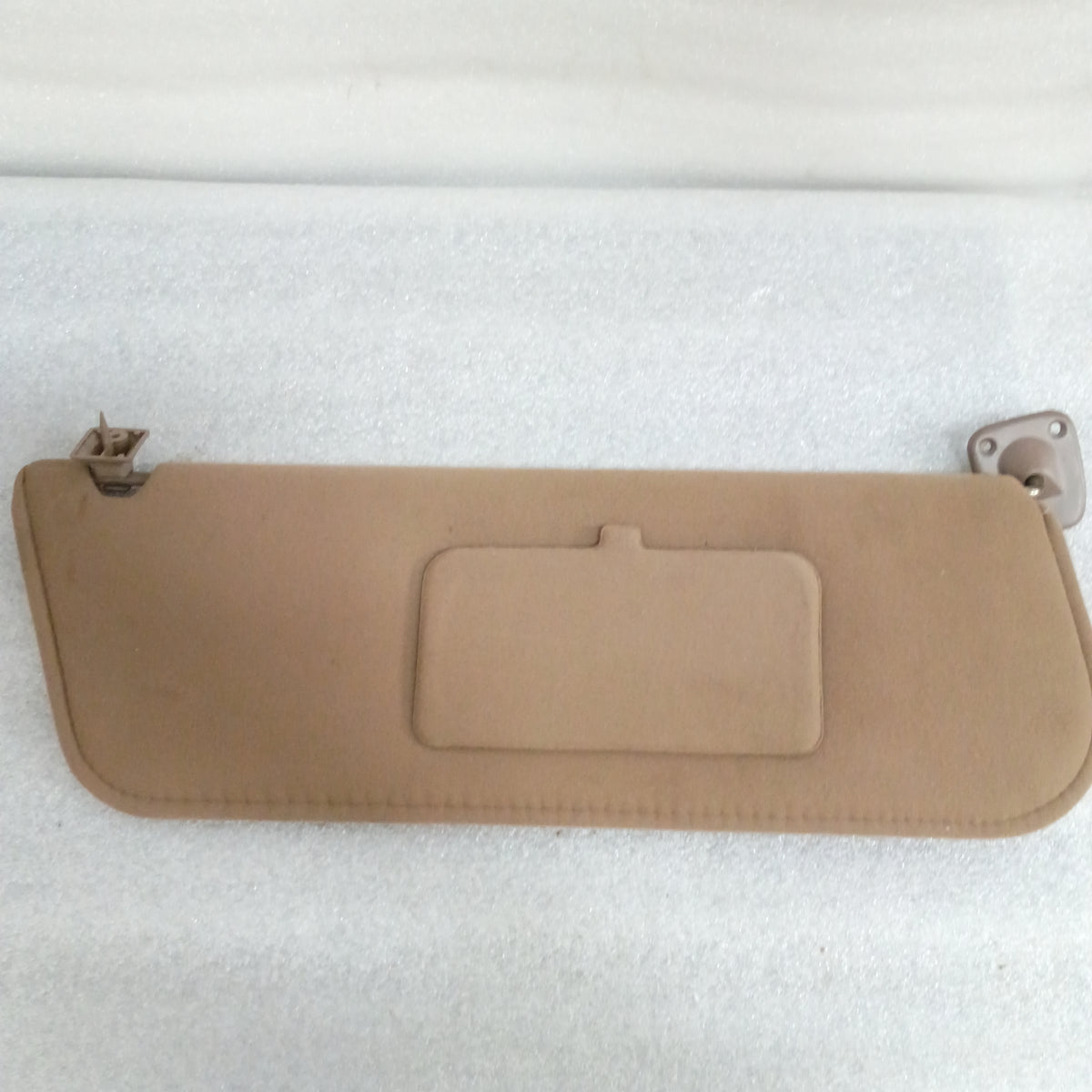 Tan cloth sun visor with a fold-down vanity mirror, compatible with 1992-1997 Ford F150-F350 and Bronco, OEM part.