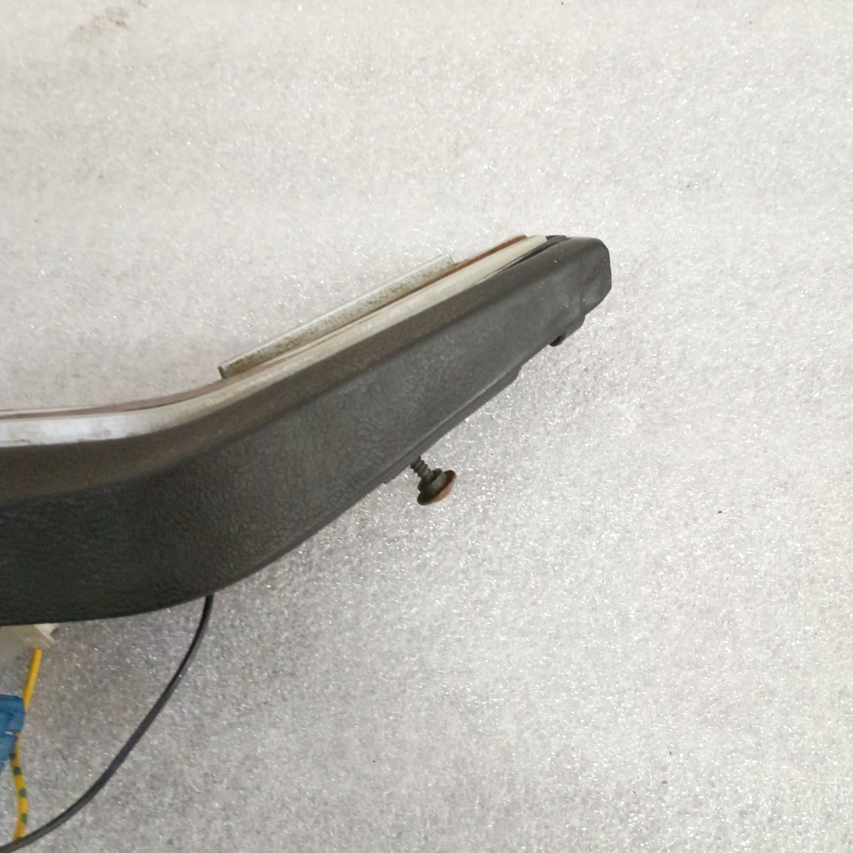 Ford OEM horn pad with cruise control buttons, visible edge view. Fits 1980-1986 F-series trucks and Bronco models.