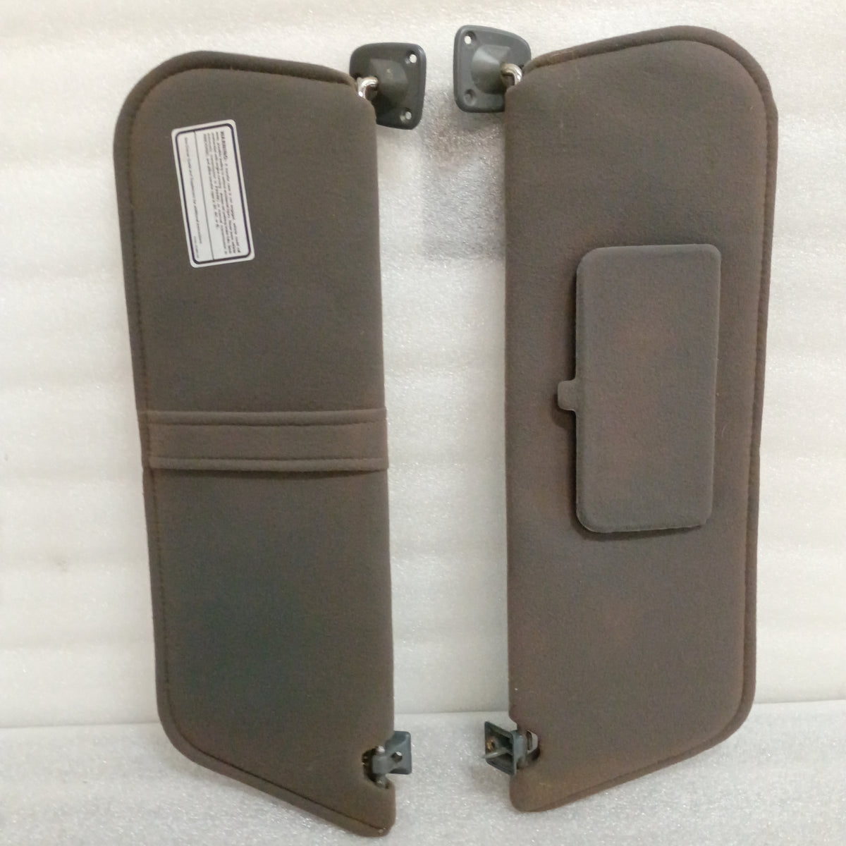 Dark gray cloth sun visors pair with hinges and vanity mirror for 1987-1991 Ford Bronco, F-150, F-250, F-350.