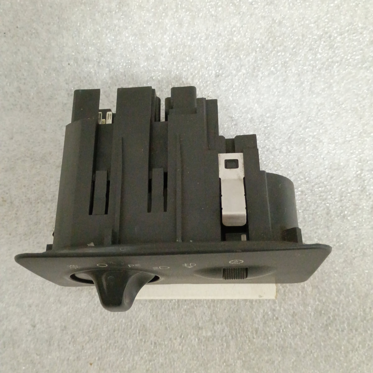 Headlight panel with switch and dimmer for 2001-2004 Ford F250/F350 Super Duty, part number 1C3T-11654.