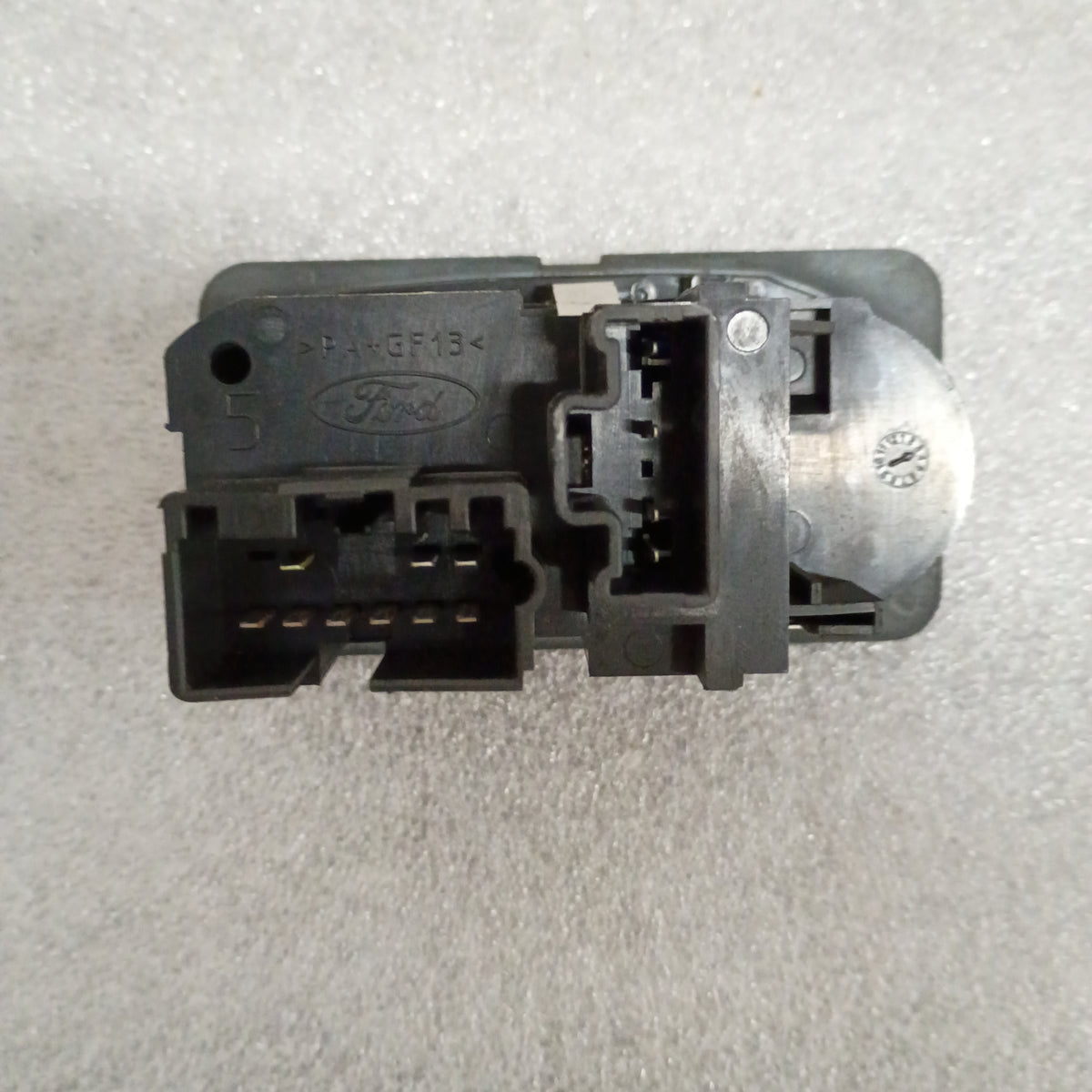 Ford F250/F350 01-04 headlight panel with switch and dimmer, part F81B-11654AG, fits lower right dash corner.