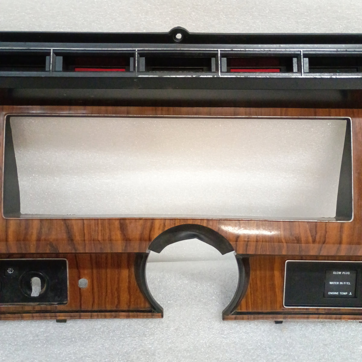 80-86 Diesel Rosewood Grain Gauge Cluster Bezel with AC Vents (Used) F250 F350