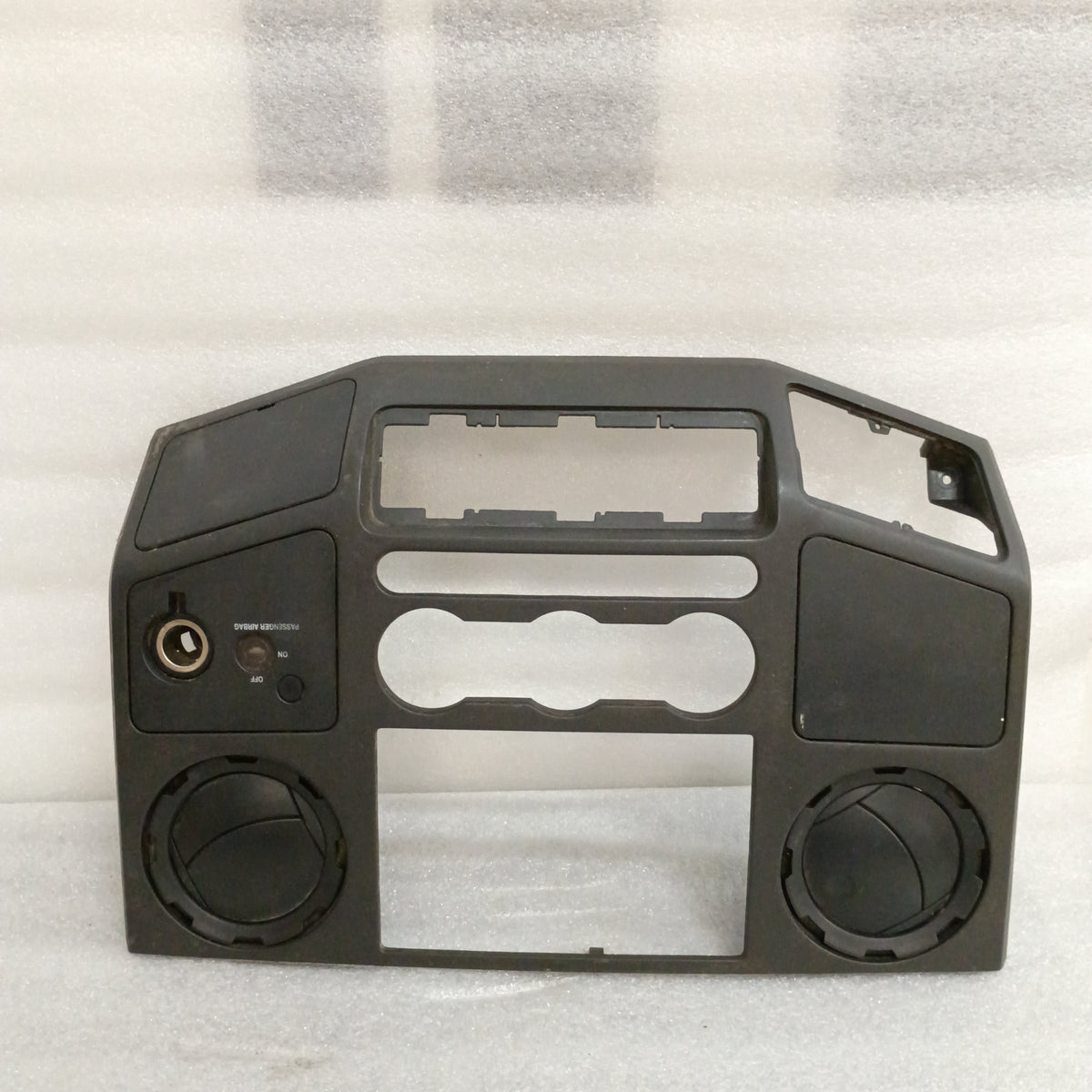 Black center dash radio and heater bezel for 2008-2010 Ford Super Duty F250/F350, with walnut wood grain and switch openings.