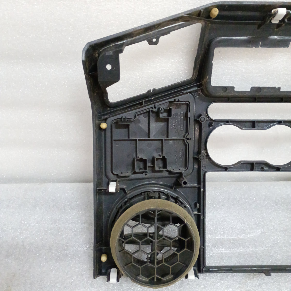 Black dash radio and heater bezel with walnut wood grain pattern for 08-10 Ford F250/F350 Super Duty. Openings for switches.
