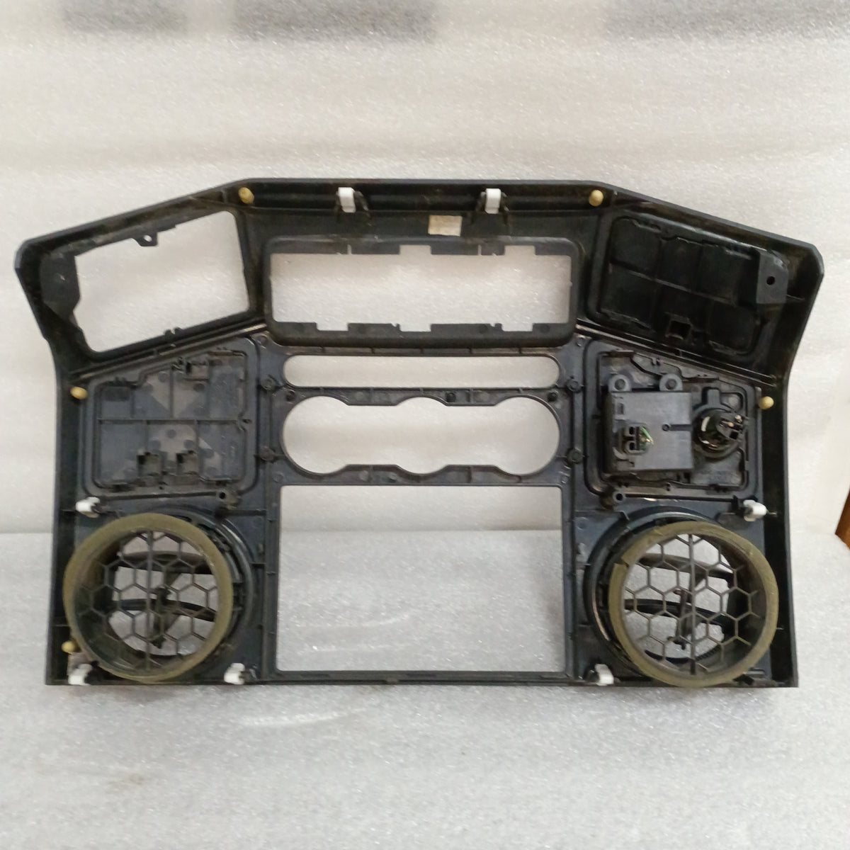 Black center dash radio and heater bezel for 2008-2010 Ford F-250/350 Super Duty, openings for switches, walnut wood grain.