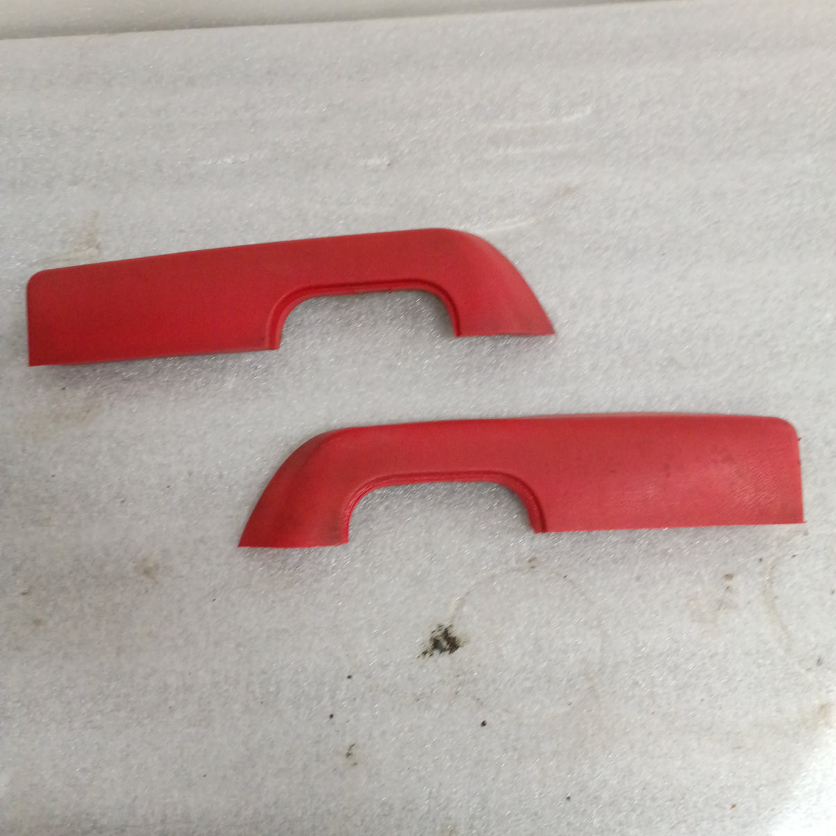 Red arm rest set for 1973-1979 Ford F100-F350, Bronco, includes original door pull cups, left and right pieces displayed.