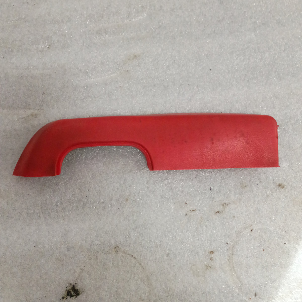 Red armrest for 1973-1979 Ford F100-F350, Bronco; OEM part with door pull cup.