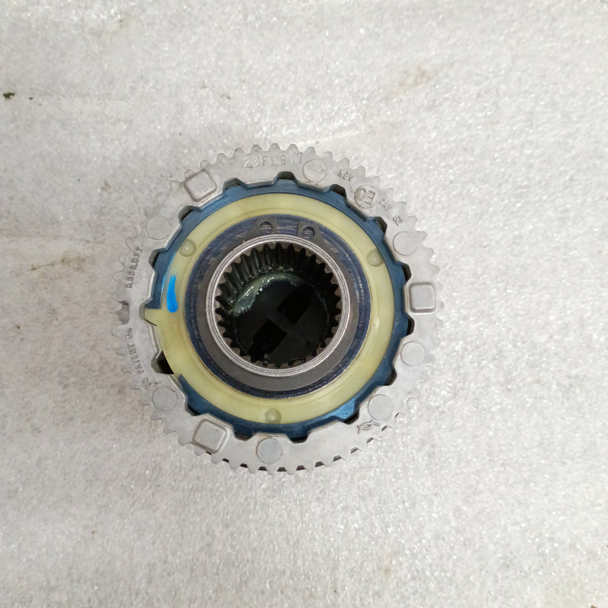 Ford OEM manual locking hub for F250/F350 Super Duty, fits Dana 50/60 axles, silver finish, used condition with normal wear.