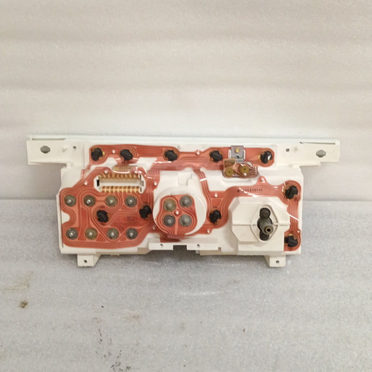 Rear view of a 1980-1986 Ford truck diesel gauge cluster circuit board, refurbished, showing copper traces and connectors.