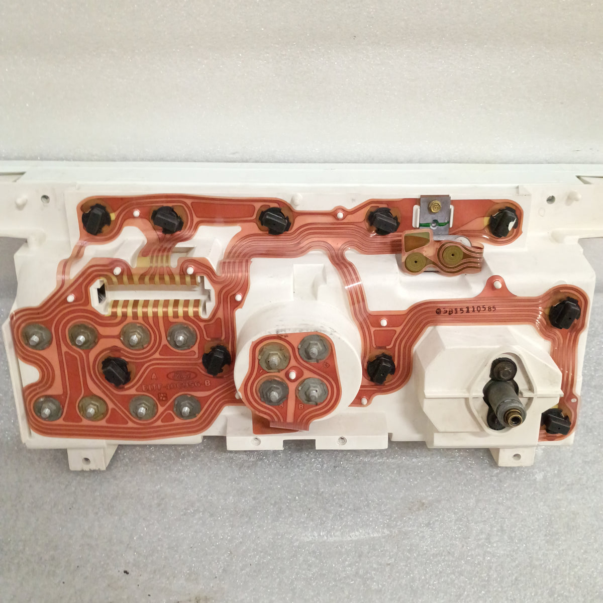 Refurbished Ford truck diesel gauge cluster, rear view showing circuitry and connectors, compatible with 1980-1986 models.