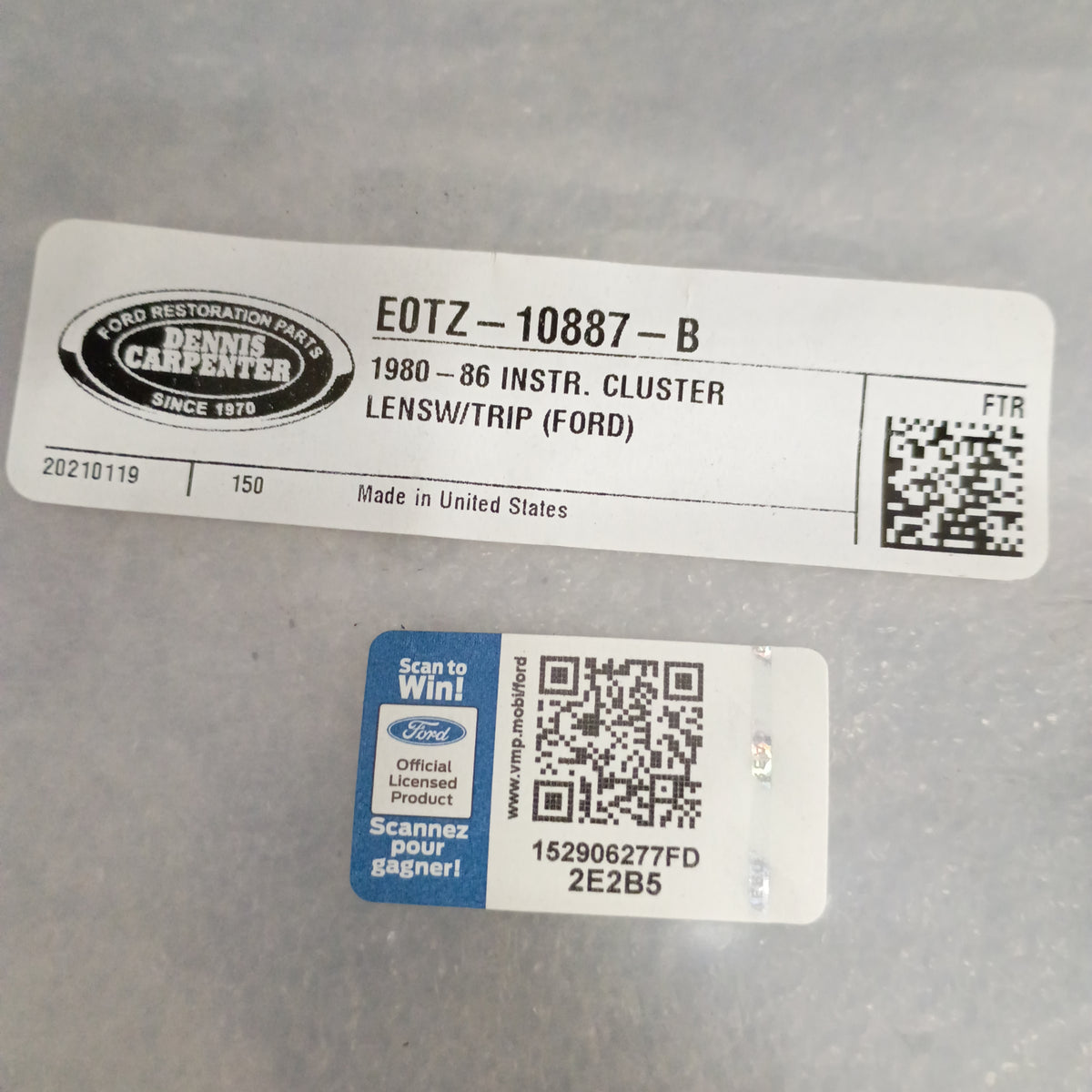 Dennis Carpenter label for 1980-86 Ford instrument cluster lens with QR code, indicating official licensed product.