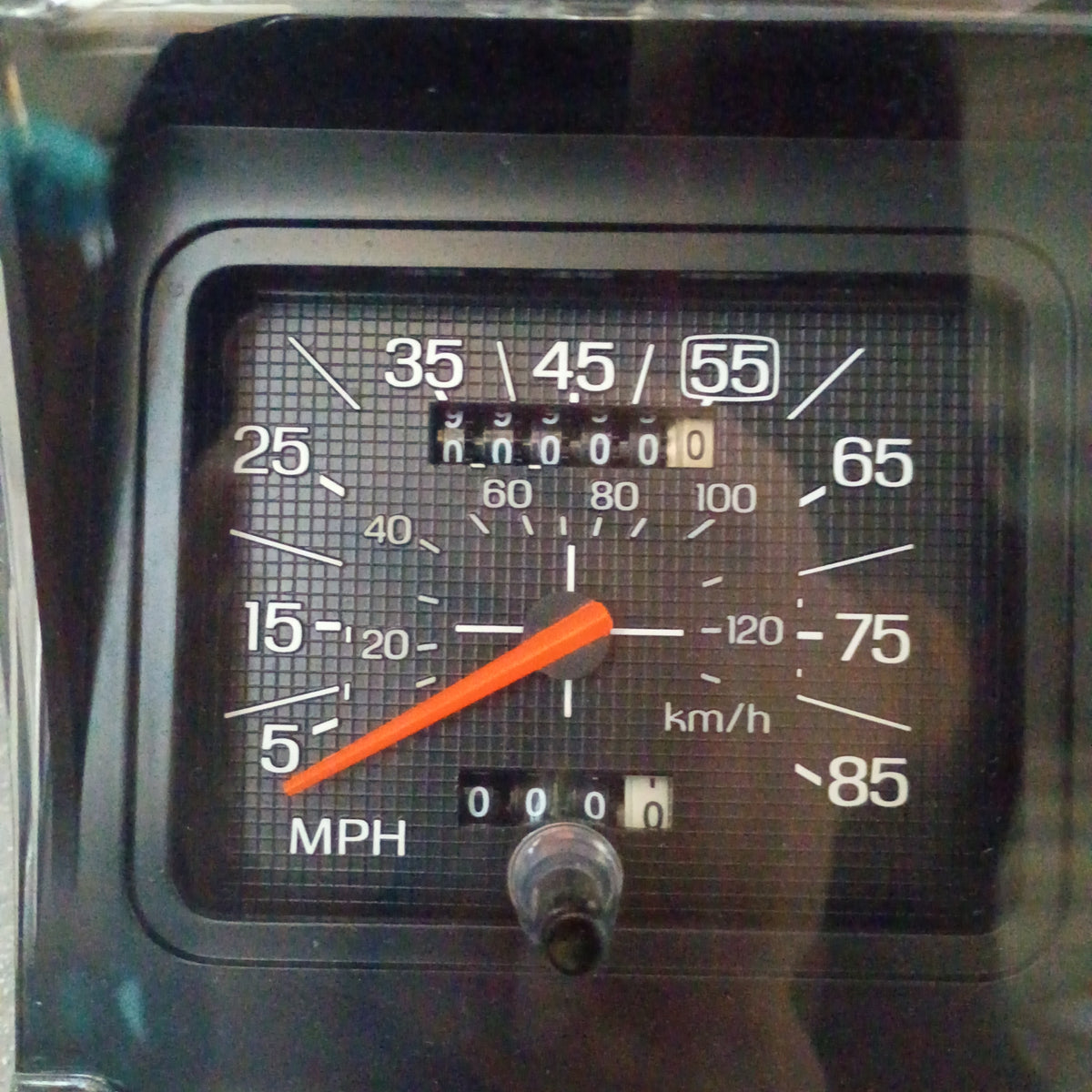 Refurbished Ford truck speedometer with reset odometer, showing readings in MPH and km/h, compatible with 1980-1986 models.