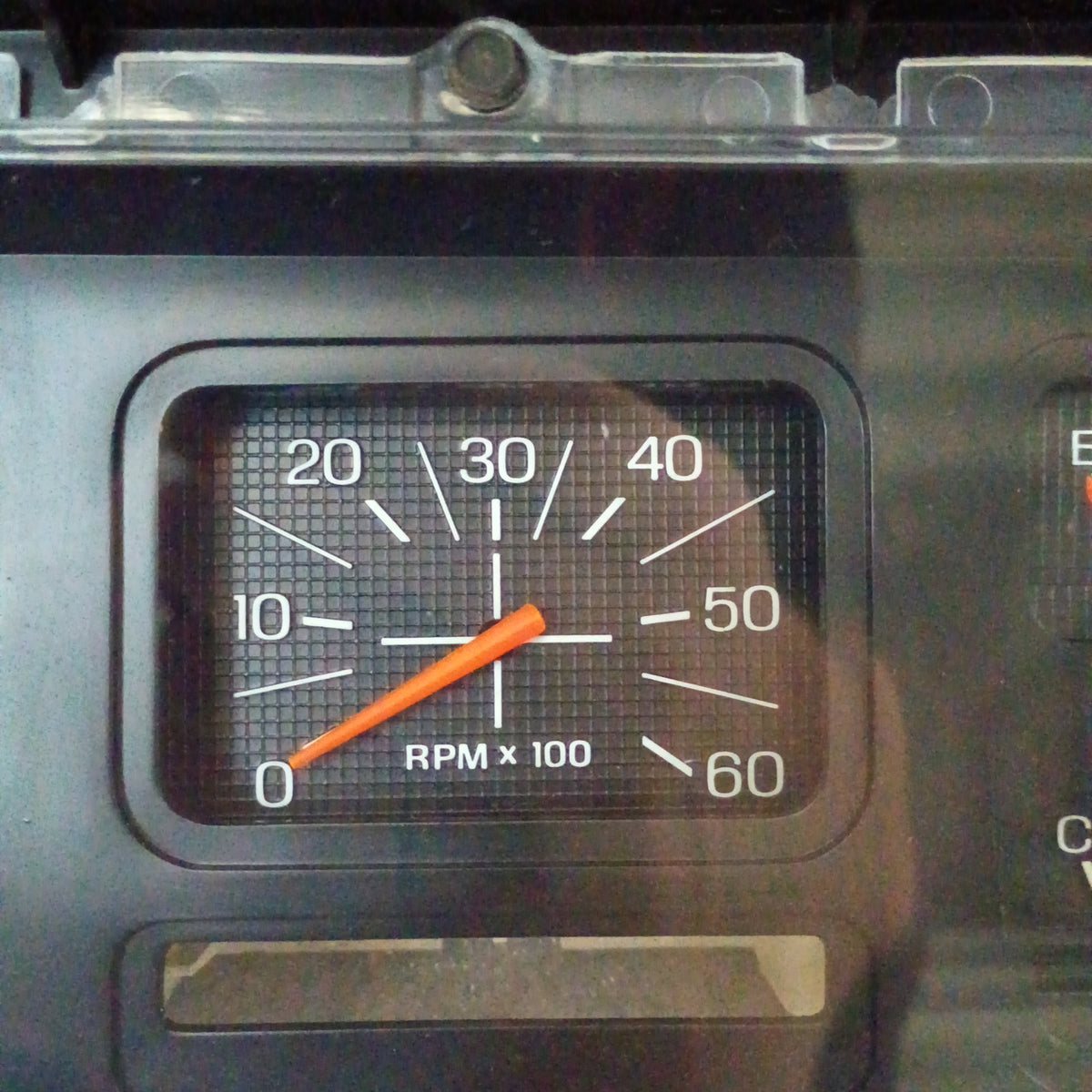 Refurbished Ford truck gauge cluster tachometer, RPM x 100, orange needle, fits 1980-1986 Ford models like F150, F250, F350.