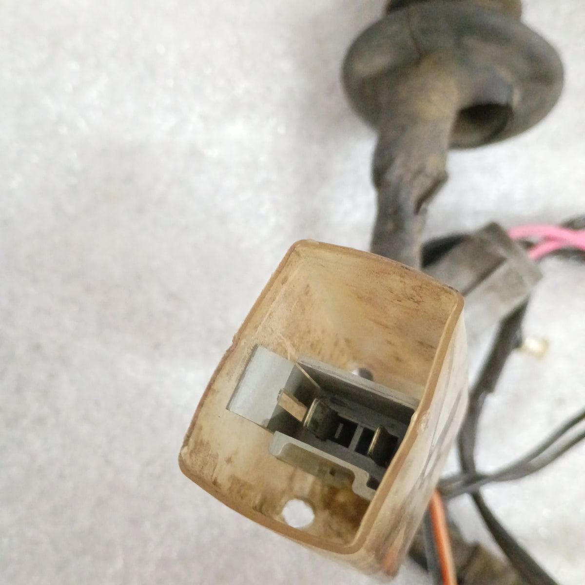 Ford truck door wire harness connector with attached cables and rubber boot, compatible with 1987-1991 F-Series and Bronco.