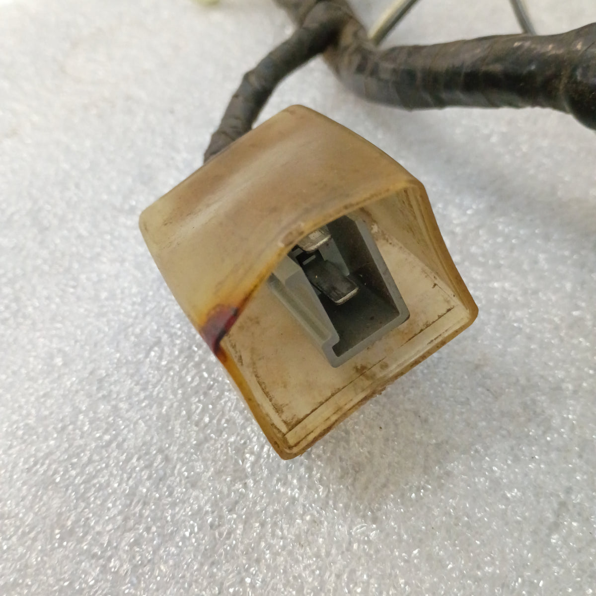 Ford wire harness connector for power windows and locks, showing a close-up of one connector with attached wiring.