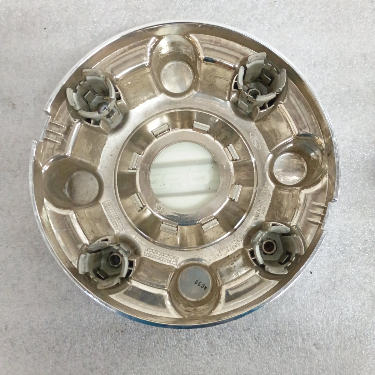 Chrome Ford wheel center cap, part number HC3C-1A096-KD, for 2017-2023 F250/F350, with clips and open center design.