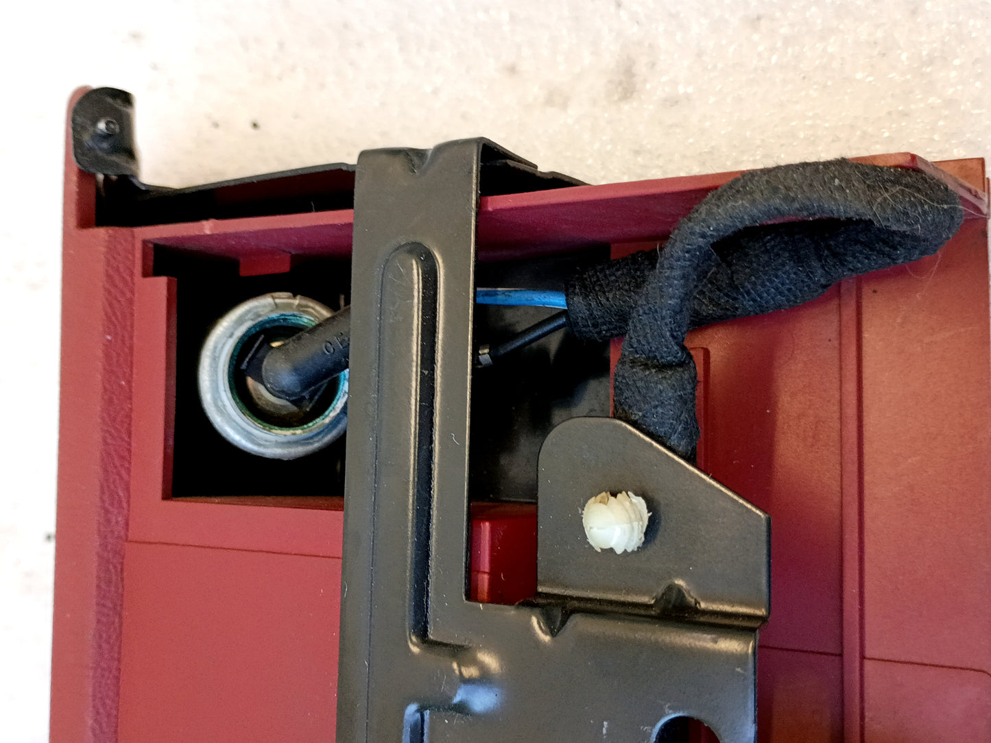 Scarlet red Ford ashtray assembly with power port, wiring harness, and mounting bracket for 1992-1996 F150, F250, F350, Bronco.