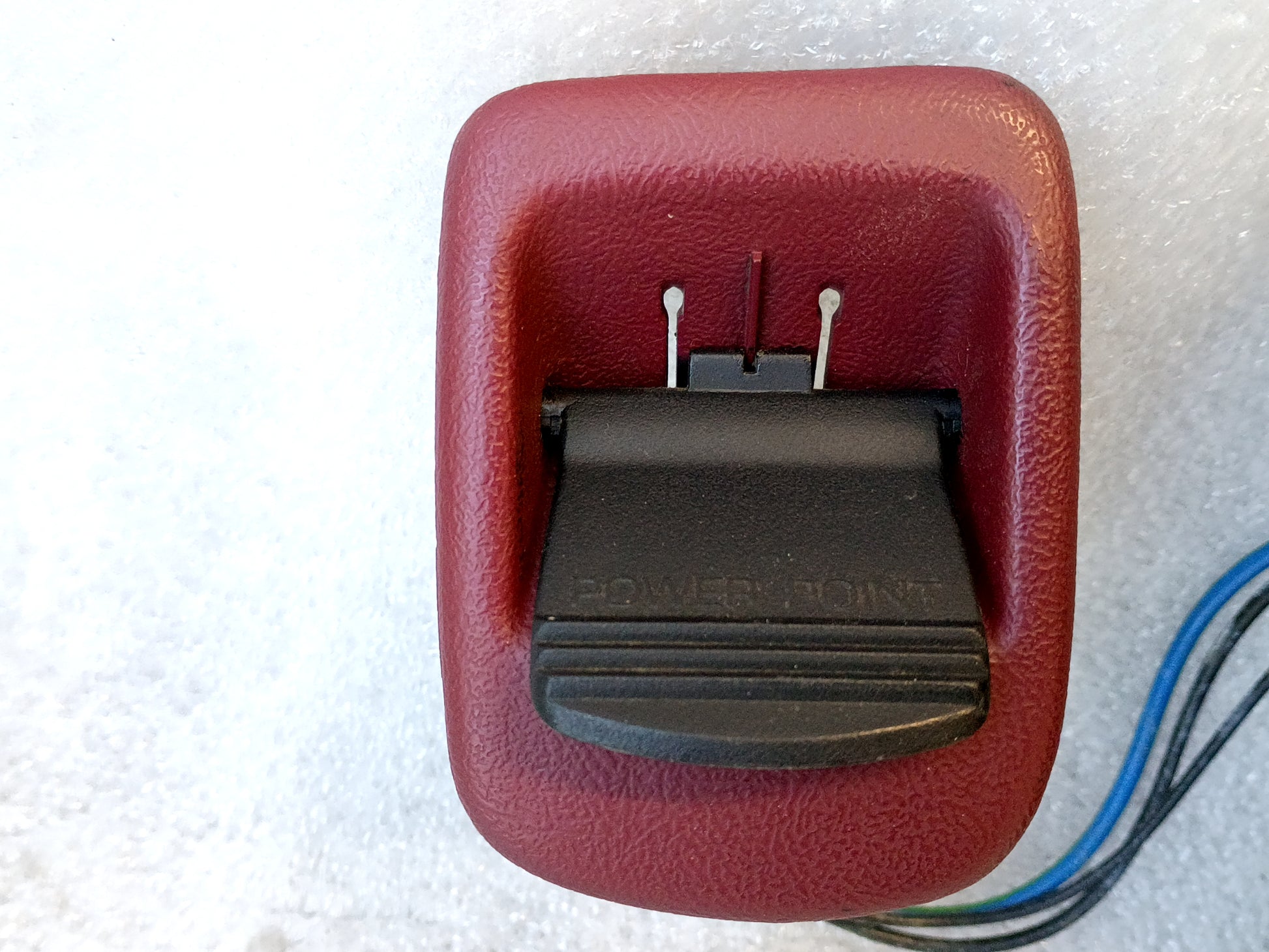 Refurbished dark ruby red ashtray assembly with power port and wiring harness for 1992-1996 Ford trucks and Bronco.